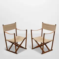 Pair of MK-16 Folding Chairs by Mogens Koch, for Interna, rosewood, leather, brass, canvas, with brass maker's tag stamped 'Made in Denmark Interna Professor Mogens , offered Mar 2026
