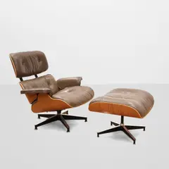 Charles Eames and Ray Eames, 670 Lounge Chair and 671 Ottoman, for Herman Miller, rosewood, leather, aluminum, with black Herman Miller labels on undersides of chair and ottoman