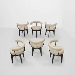 Six Indochine Swivel Chairs by Charlotte Perriand, for Cassina, ebonized ash, leather, each with Cassina maker's mark, serial number, and 'ChPerriand' signature on undersi, sold Mar 2026