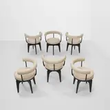 Six Indochine Swivel Chairs by Charlotte Perriand, for Cassina, ebonized ash, leather, each with Cassina maker's mark, serial number, and 'ChPerriand' signature on undersi, sold Mar 2026