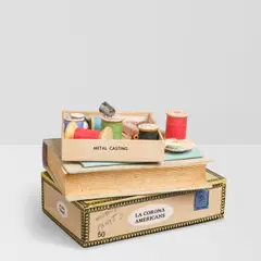 Richard Shaw, Untitled (Stack of Books with Spools of Thread), hand-painted and glazed porcelain, signed and dated on underside