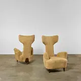 Renzo Zavenella, Pair of Lounge Chairs, sheepskin upholstery, oak
