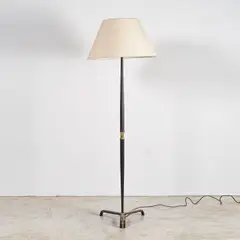 Jacques Adnet, Lampadaire, A floor lamp in leather, brass and gilt metal by Jacques Adnet circa 1950