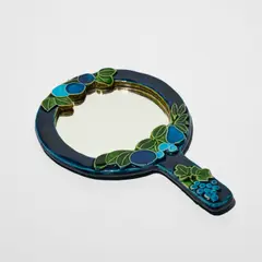 Mithé Espelt, Face à main, A hand mirror in glazed earthenware and mirrored glass by Mithé Espelt circa 1990