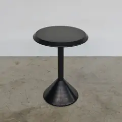 Guéridon Costes by Philippe Starck, A 'Costes' side table in lacquered steel, concrete and rubber designed by Philippe Starck in 1984 and edited by Baleri, sold Apr 2026