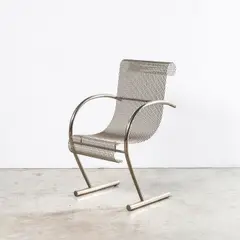 Chaise Sing Sing Sing by Shiro Kuramata, A 'Sing Sing Sing' armchair in chrome-plated steel and metal mesh designed by Shiro Kuramata in 1985 and edited by XO, sold Apr 2026