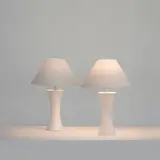 Julien Barrault, Paire de lampes Parenthèse, A monogrammed pair of 'Paranthèse' lamps in glazed ceramic designed by Julien Barrault and executed by Laurence Roudy in 2024