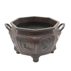 Macetero, CHINA, PRINCIPIOS DEL SIGLO XX, Bronce, patinado en color marrón; decorado con relieves de aves fénix, tigres y perros Fo, borde octagonal