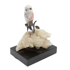 Ave, SIGLO XX, Talla en piedra veteada, base de cuarzo y zócalo de mármol negro, con aplicaciones de plata, figura móvil
