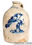 J. & E. NORTON / BENNINGTON, VT Stoneware Jug w/ Bird-on-Stump Decoration by J. & E. Norton, circa 1855, Stoneware, sold Oct 2019