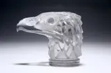 René Lalique (French, 1860-1945), A 'Tête D'Aigle' Car Mascot, Designed 1928 by René Lalique, glass, moulded R, sold May 2023