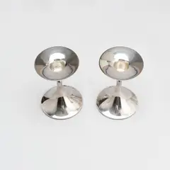 Pair of Candlesticks, Trumpet, Kultakeskus, Hämeenlinna by Tapio Wirkkala, silver, offered Sep 2026