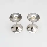 Pair of Candlesticks, Trumpet, Kultakeskus, Hämeenlinna by Tapio Wirkkala, silver, offered Sep 2026
