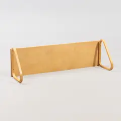 Shelf, model 112B, Artek, late 20th century by Alvar Aalto, lacquered birch, sold Aug 2026