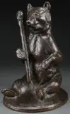 Emile Perrault, A Seated Bear with Club, Bronze with brown patina