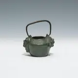Gustav Gurschner, Small pot with handle "Theatermasken, Bronze, patinated; signed "GURSCHNER/VIENNE" below one head.