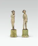 Bruno Zach, Boy and girl nude, bronze, partly cold-painted; onyx base; signed on the upper side of the plinth "Bruno Zach" (girl) and "Zach" (boy)