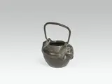 Gustav Gurschner, Small handlepot "theater masks