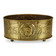 GLASGOW SCHOOL PLANTER, CIRCA 1910 by Marion Henderson Wilson, 1910, repoussé-decorated brass, sold Oct 2025