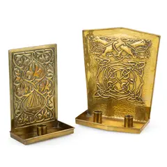 Alexander Ritchie, TWO CANDLE SCONCES, CIRCA 1920, 1920, repoussé-decorated brass (2)