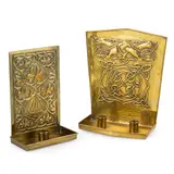 Alexander Ritchie, TWO CANDLE SCONCES, CIRCA 1920, 1920, repoussé-decorated brass (2)