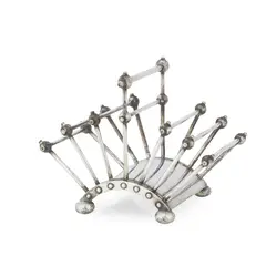 ARTICULATED LETTER RACK, 1881 by Christopher Dresser, 1881, sold Apr 2025