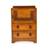 ARTS & CRAFTS CABINET CHEST, CIRCA 1910 by Arthur W. Simpson Of Kendal, 1910, oak, sold Apr 2025