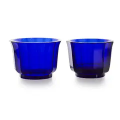 TWO MOSER BOWLS, CIRCA 1920 by Josef Hoffmann, 1920, blue glass, sold Apr 2025