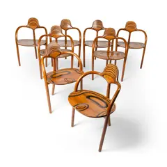 John Makepeace, SET OF EIGHT 'TRINE II' ARMCHAIRS, 2001, 2001, alternate laminated layers of yew and 5,000 year old bog-oak