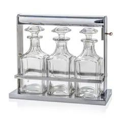 TANTALUS, CIRCA 1935 by Jacques Adnet, 1935, glass carafes, sold Oct 2024