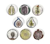 SET OF EIGHT 'SEZIONE DI FRUTTA' COASTERS by Piero Fornasetti, porcelain, sold Apr 2024