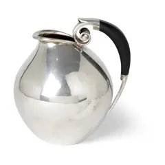 Jug, circa 1925-32 by Johan Rohde, 1925, designer's mark, GI925S and STERLING DENMARK, sold Oct 2023