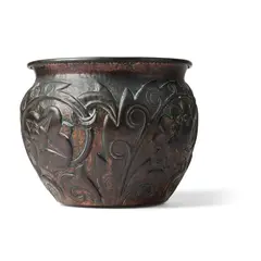 JARDINIÈRE, 1897 by John Pearson, 1897, repoussé-decorated copper, sold Oct 2023