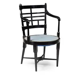 AESTHETIC MOVEMENT 'JACOBEAN' ARMCHAIR, CIRCA 1880 by Edward William Godwin, 1880, ebonised wood with later upholstered seat, sold Apr 2023