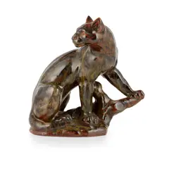 FIGURE OF A PANTHER, CIRCA 1930 by Charles Vyse, 1930, glazed stoneware, sold Apr 2023