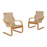 Pair of Armchairs by Alvar Aalto, laminated birch, sold Oct 2022