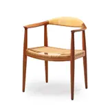 'Round Chair / The Chair', designed 1949 by Hans J. Wegner, 1949, teak and bamboo, sold Apr 2022