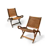 Two 'Ninfea' Folding Chairs, 1950s by Gio Ponti, stained beech and woven cane, sold Apr 2022