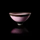 Footed bowl, circa 1980 by Lucie Rie, 1980, porcelain with a pink glaze, sold Apr 2022