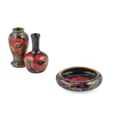 TWO MINIATURE ‘POMEGRANATE’ PATTERN VASES, CIRCA 1915 by William Moorcroft, 1915, glazed earthenware, sold Oct 2021