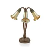 THREE-LIGHT ‘LILY’ TABLE LAMP, CIRCA 1910 by Tiffany Studios, 1910, patinated bronze and 'favrile' glass, sold Oct 2021