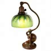Tiffany Studios, Lamp 181 with Pomegranate Shade, The three light bronze base with green and red patina, the shade with yellow and orange panes, green panes to pomegranate horizontal band