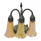 Three Light Bronze Piano Lamp. by Tiffany Studios, sold Jan 2023