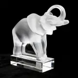 Frosted Crystal Elephant Figure by Lalique, The frosted elephant standing on a clear glass plinth, sold Oct 2022