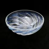 Opalescent Glass Poissons Bowl by Lalique, The round bowl with smooth interior, the exterior with fish design in relief, slight opalescence to glass throughout, sold Dec 2022