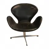 Arne Jacobsen, Black Leather Swan Chair.