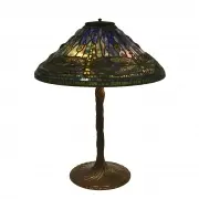 Tiffany Studios, Dragonfly Lamp., The shade is mounted on a rare bronze Twisted Vine base which has a striking patina of green with brown highlights