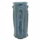 Three Women Vase 2221. by Rookwood Pottery, 1918, Cylindrical vase with a flared mouth and three women standing along the sides in relief, blue glaze, sold Nov 2019