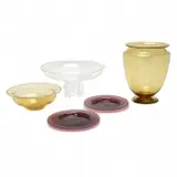 Glass Table Articles, Lot of Five. by Alexander Joseph von Steuben, 1950, Comprising of a pair of amethyst plates, a Modernist footed centerpiece bowl, a low bowl, and vase in amber glass, sold Sep 2019