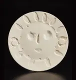 Face with palm-leaves (Visage aux palmes) by Pablo Picasso, 1956, White earthenware round dish, with Bright m ask painted in colors and glazed on the reverse; ceramic, Madoura edition, sold Oct 2018